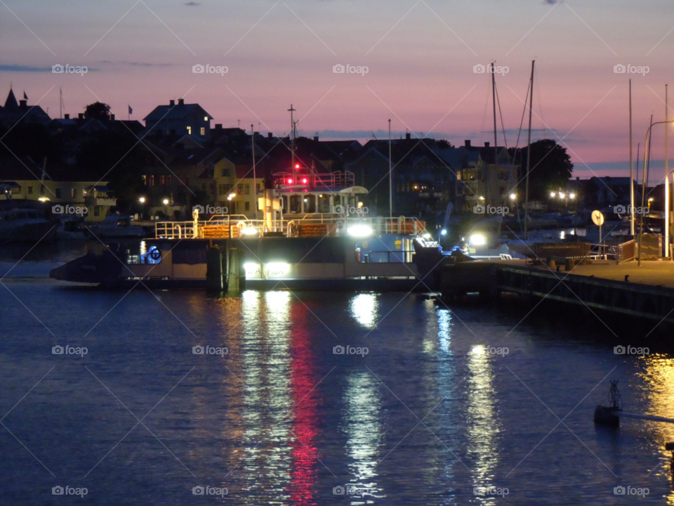 sunset water lights boat by MagnusPm