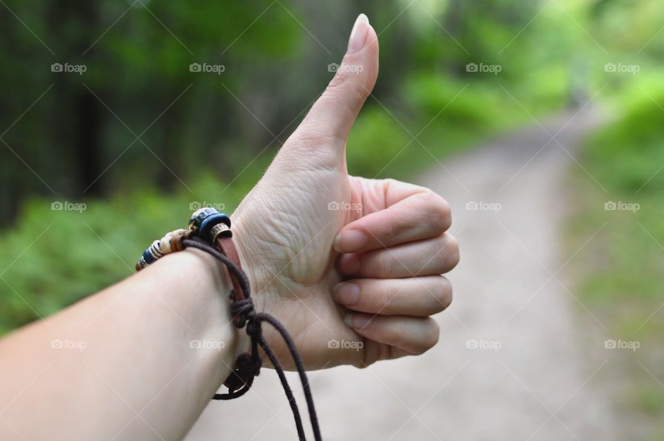 Thumbs up to a nice walk in the woods
