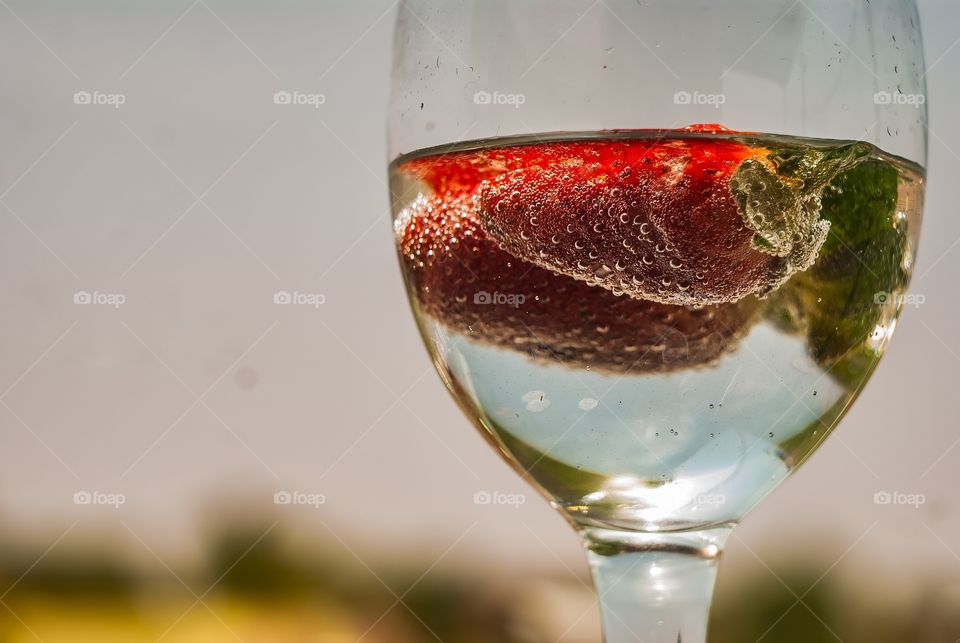 Strawberry on waterglass