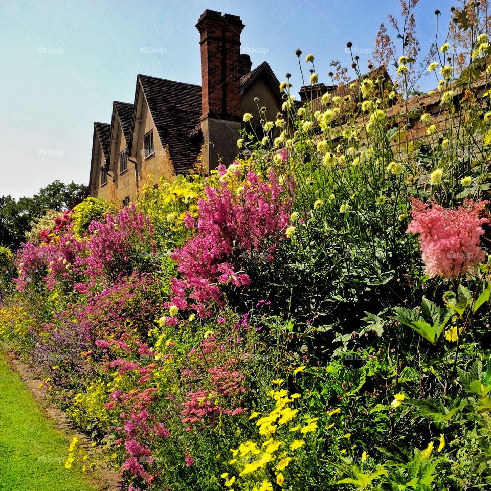 Formal gardens of Packwood House stately home - Warwickshire, England UK. 