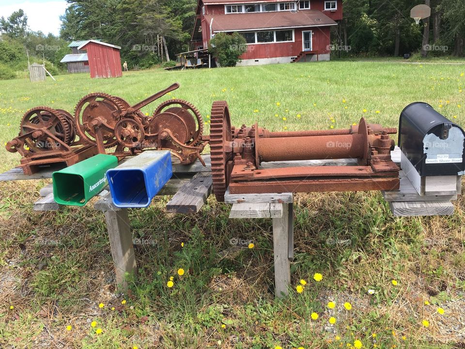 Mailbox with rusty machine parts