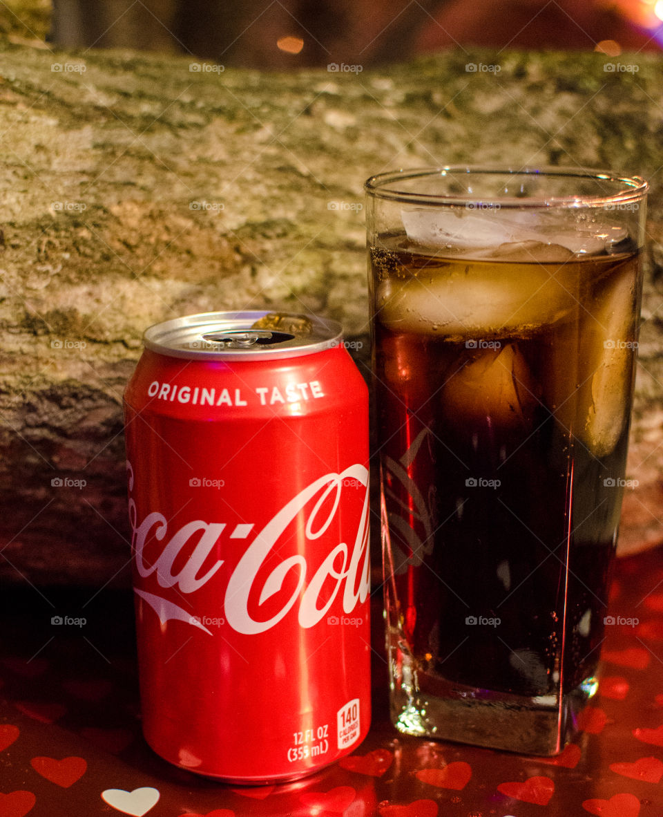 Enjoy a nice Coca-Cola in front of a warm fire