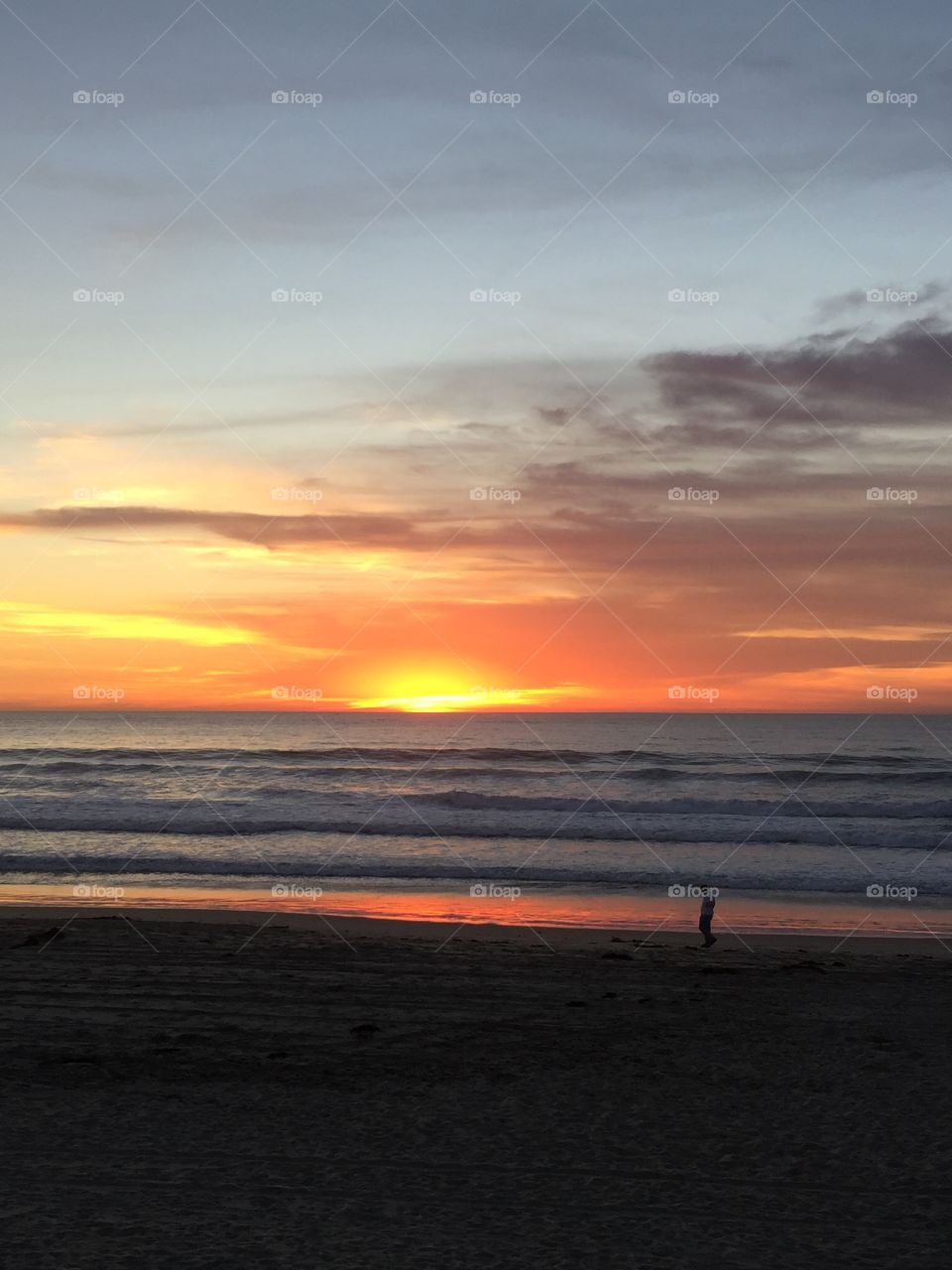 A gold sunset night on a beautiful San Diego beach 