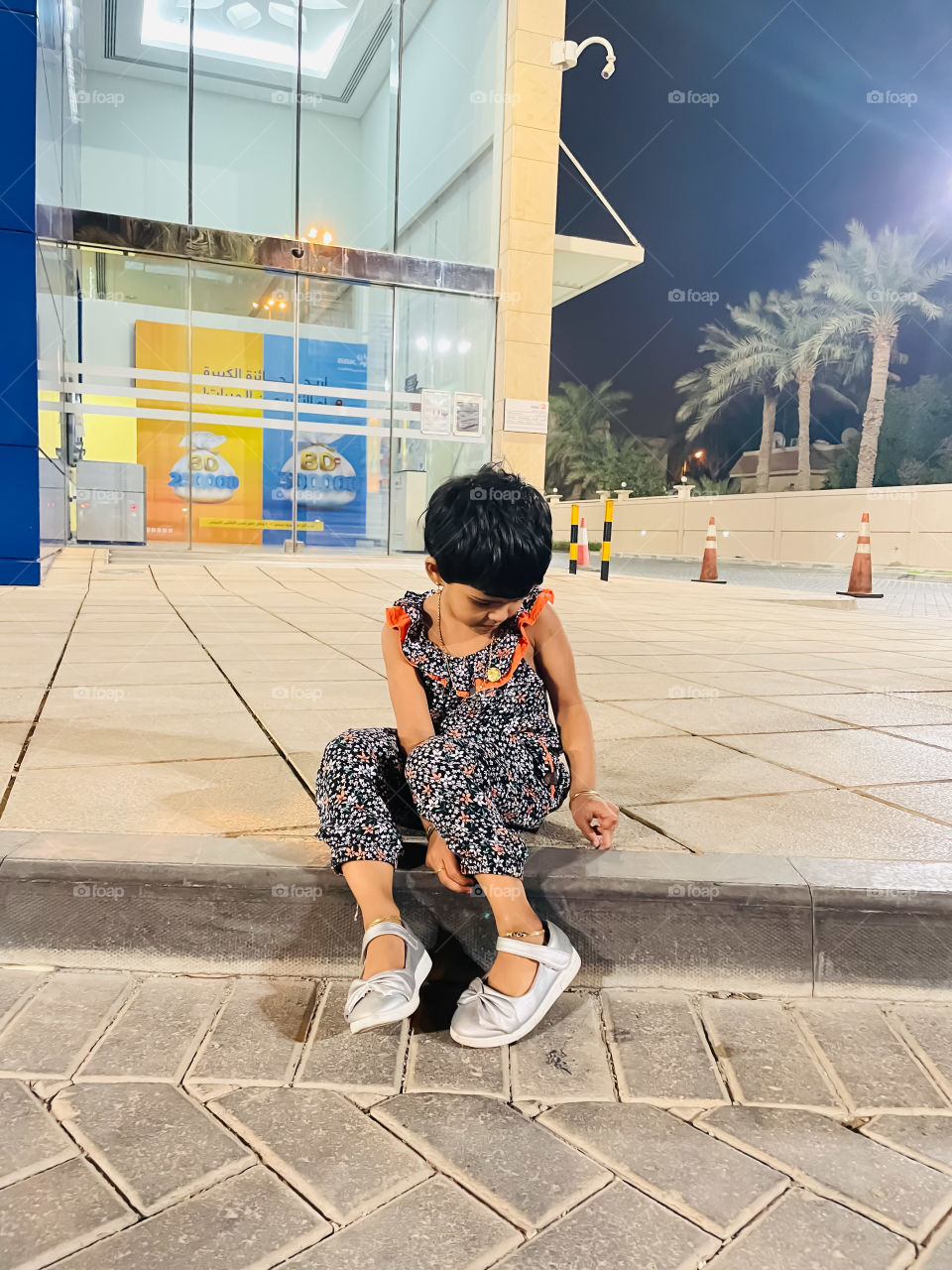 Child writing on the floor