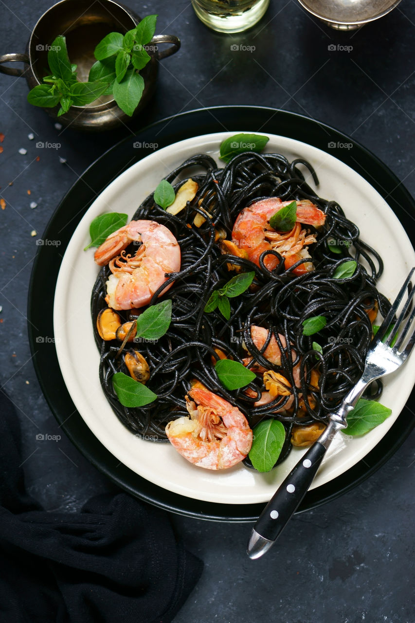 Black pasta with seafood