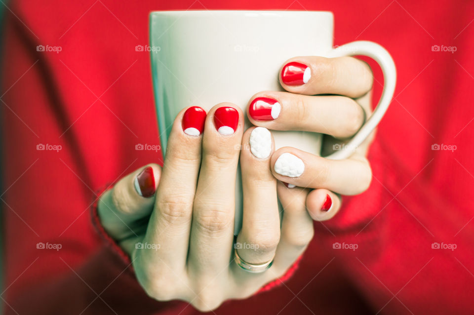 woman hand with cup of tea