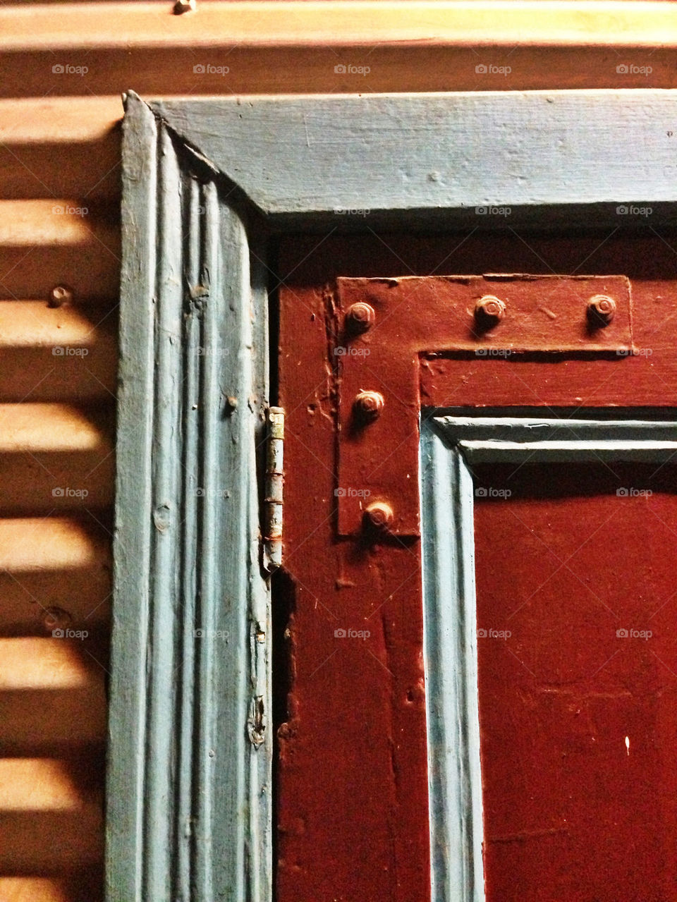 Corner of old wooden door and frame