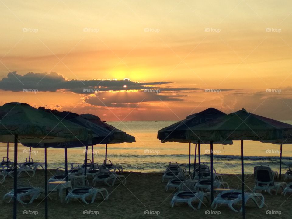 Sunrise and umbrellas