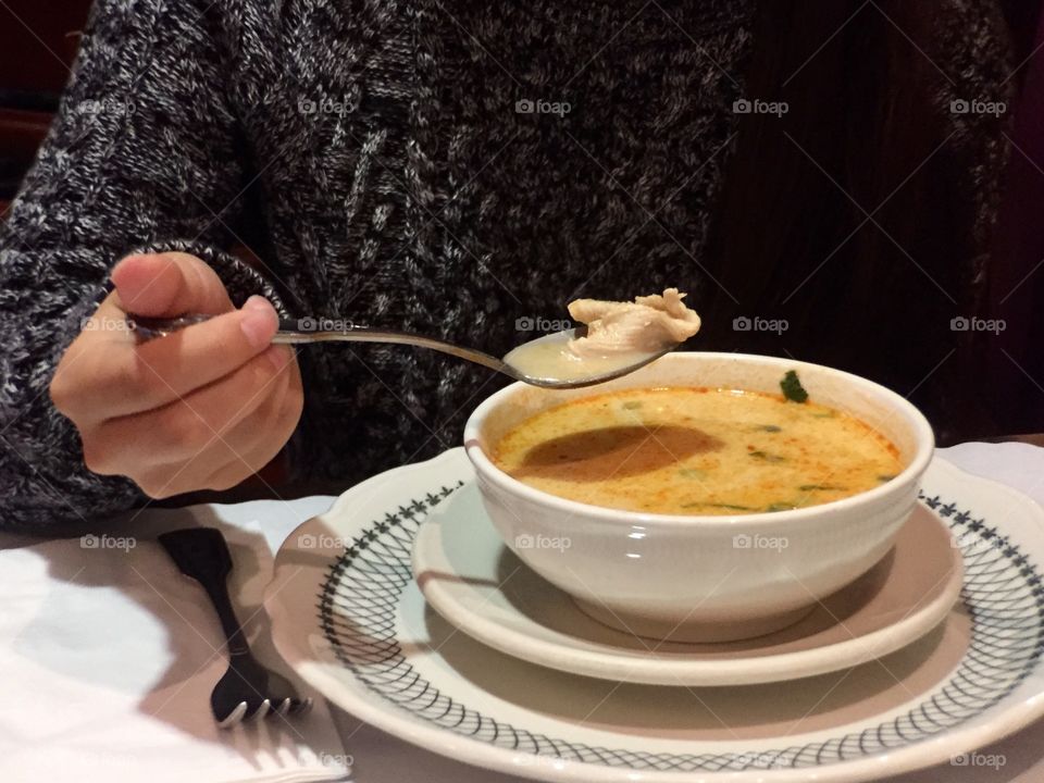 Eating soup at Restaurant 