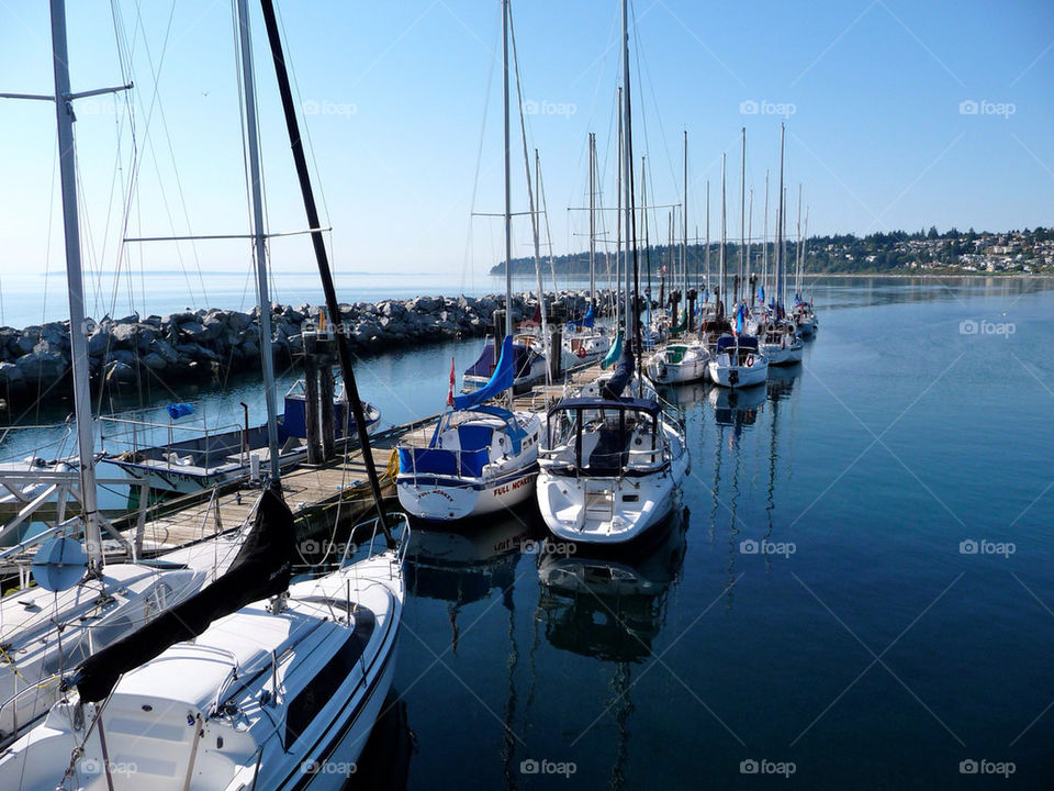 water dock reflection sailboats by markworld