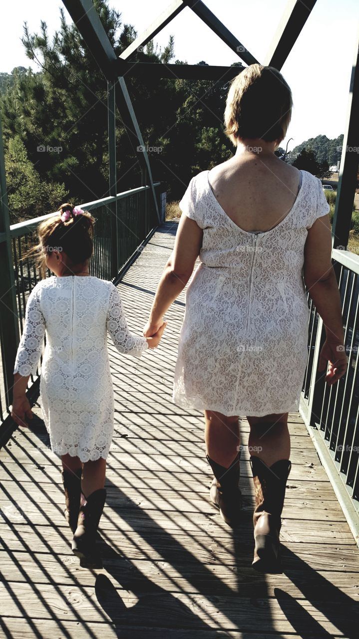 wedding pictures . grandmother and granddaughter.  park pictures.  bridge pictures .white dress.