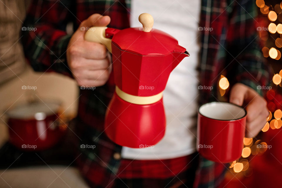 cup of coffee in a cozy festive Christmas atmosphere