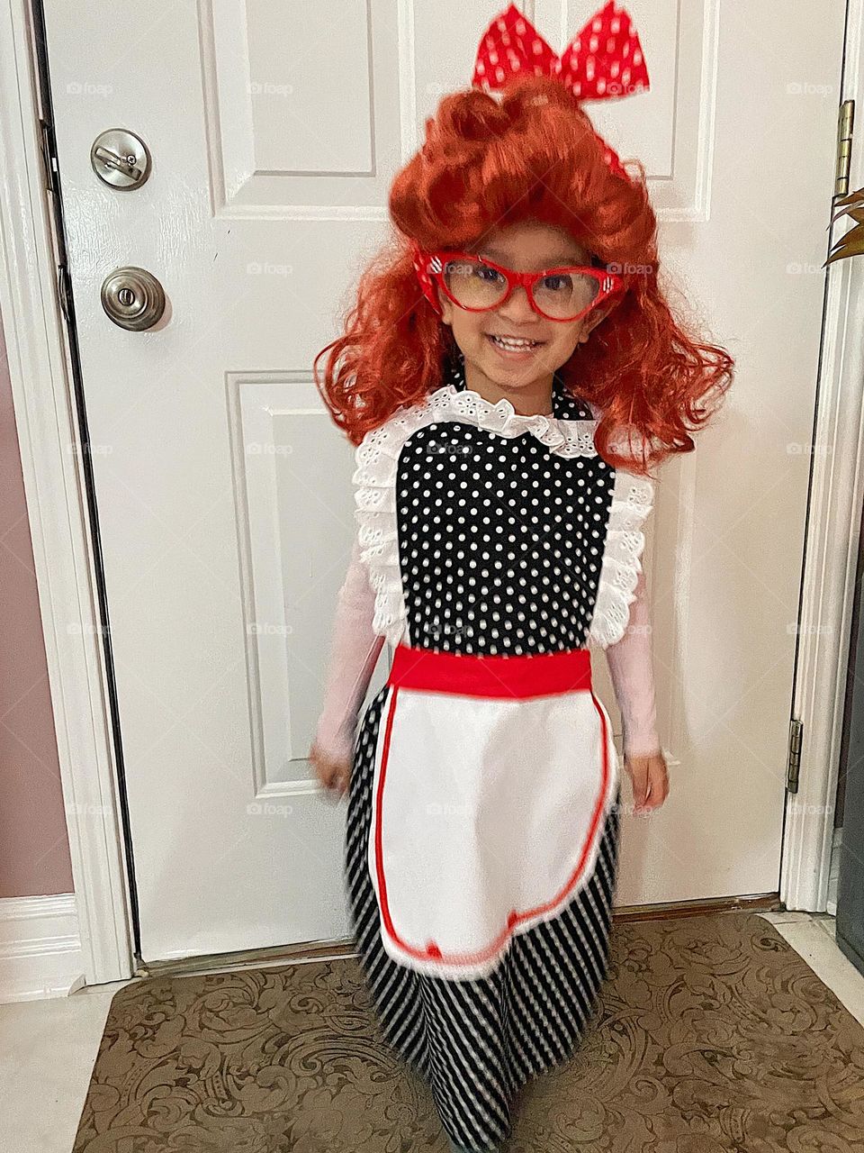 Lucille Ball costume, wearing an I Love Lucy costume, toddler wears iconic costume, tv legend Lucille Ball costume