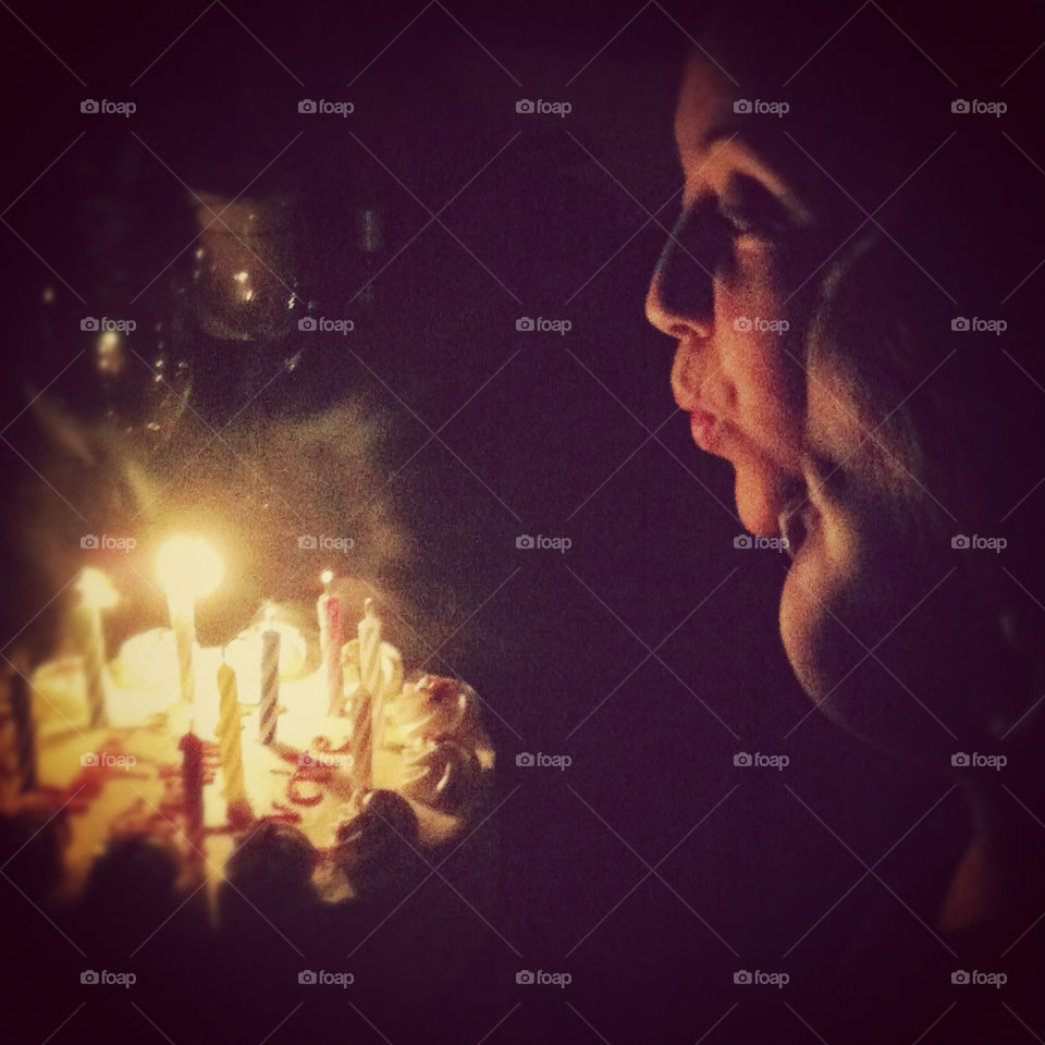 Helping mommy blow out the candles