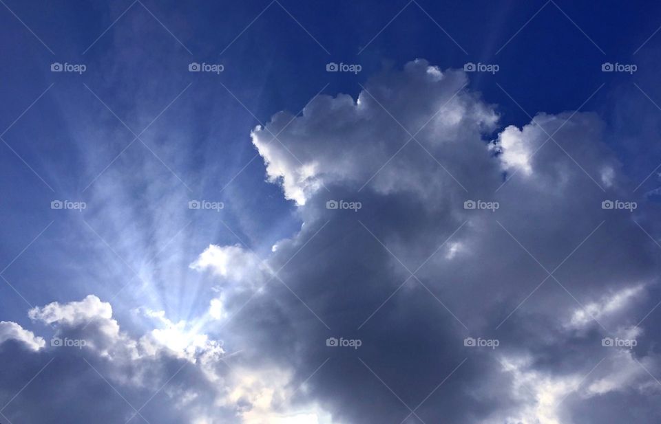 Sunrays through clouds