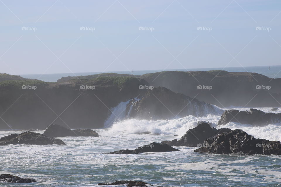 waves hitting the rocks