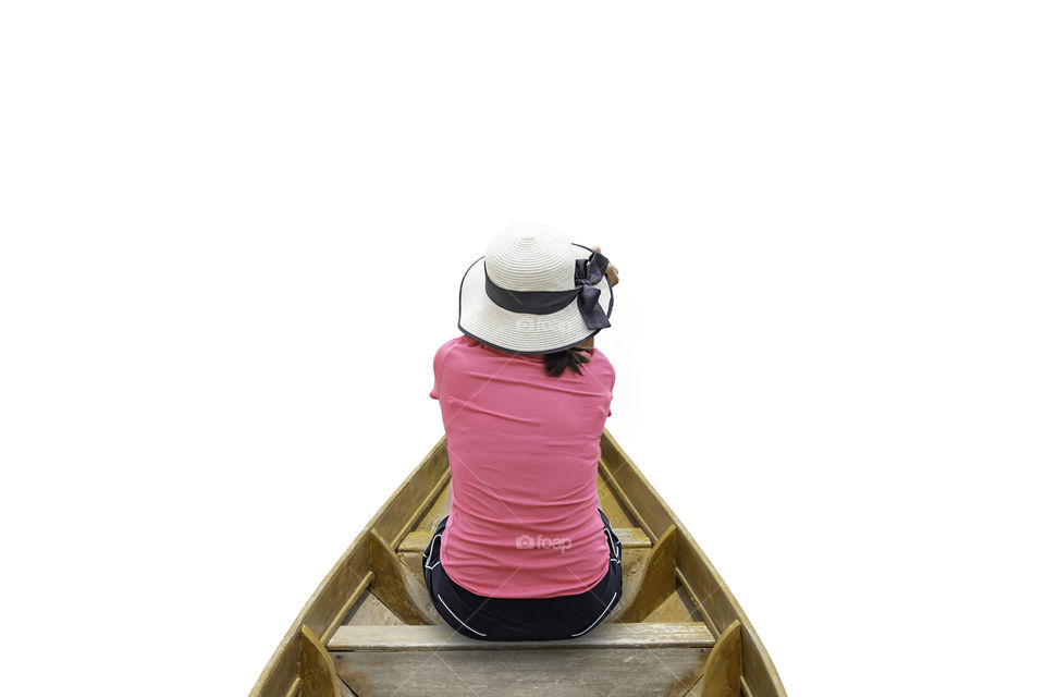 The image behind Woman wearing Hat sitting  in  wooden boat on a white background.