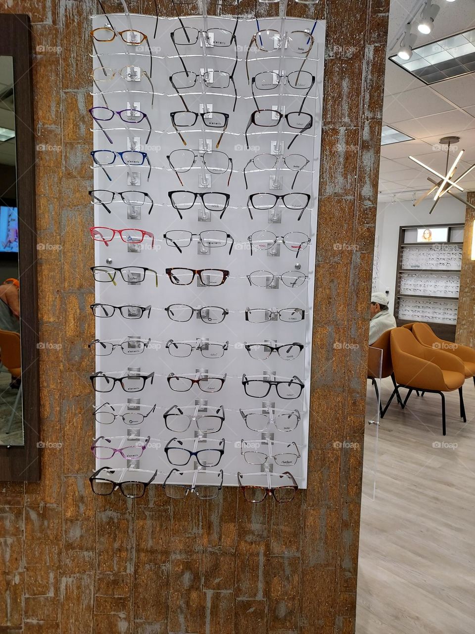 at the eye place with my husband.  he's just getting checked after cataract surgery.