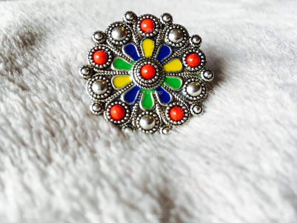 This ring is a very important part of a very exotic culture in Algeria. It's a Gypsy culture called Berber.
what a beautiful way to put value to it with this macro shot .