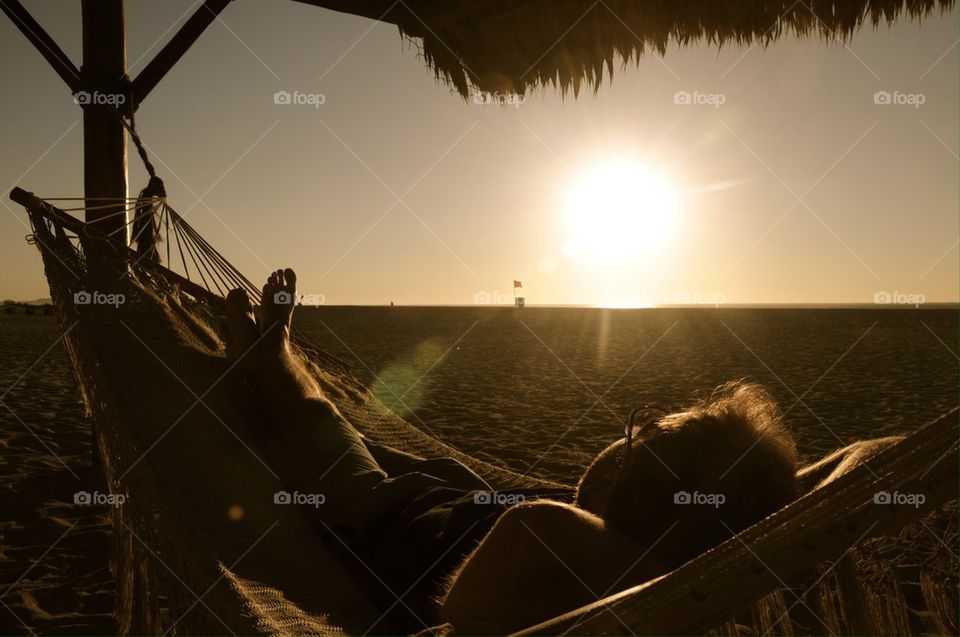 Man resting on net