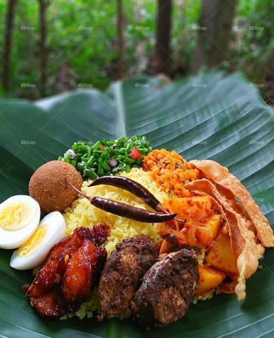 Sri Lankan rice and curry combo .