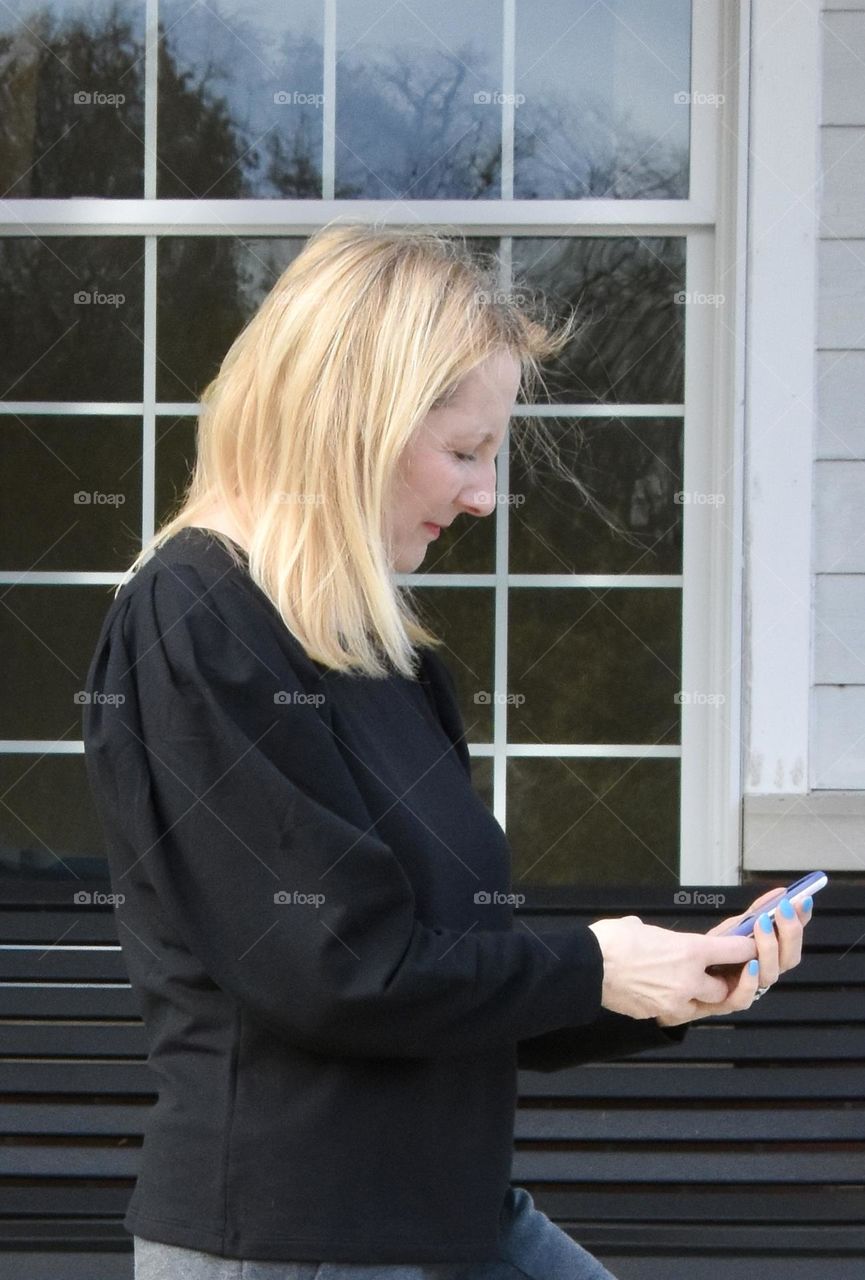 Woman looking at her phone