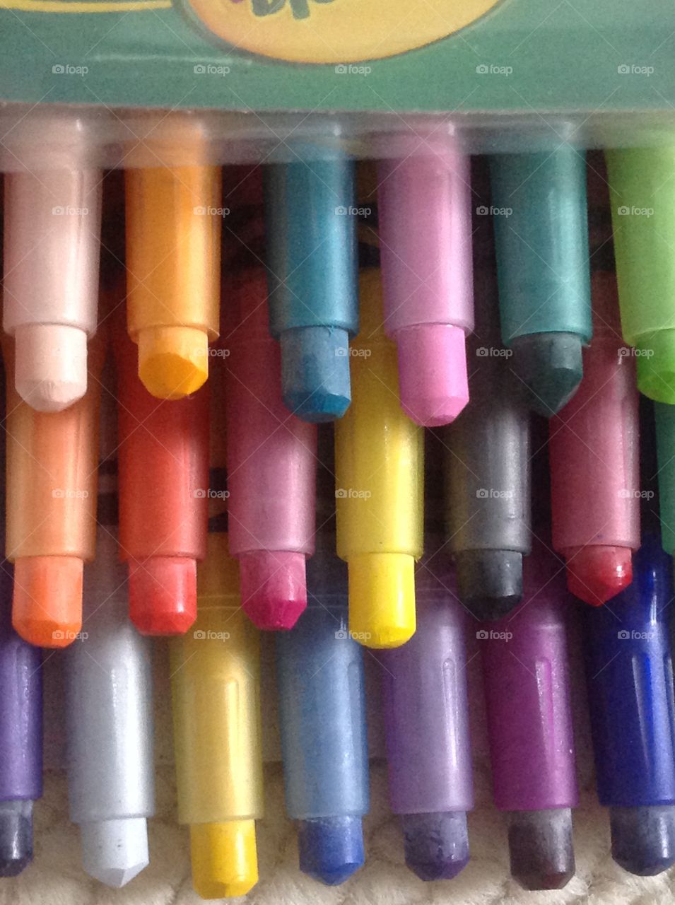 Different colored crayons for arts and crafts supplies. 