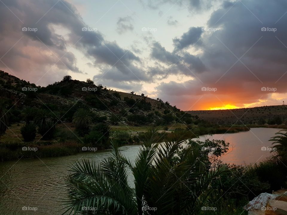 montain river mind blowing cloudy sunset