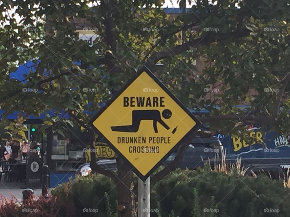 Drunk people crossing sign