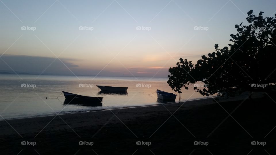 dusk with fishing skiffs