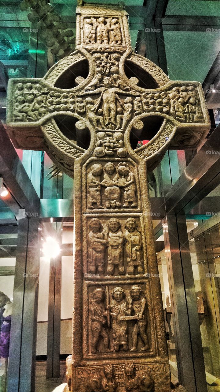 An ancient celtic stone cross in Ulster museum in Belfast