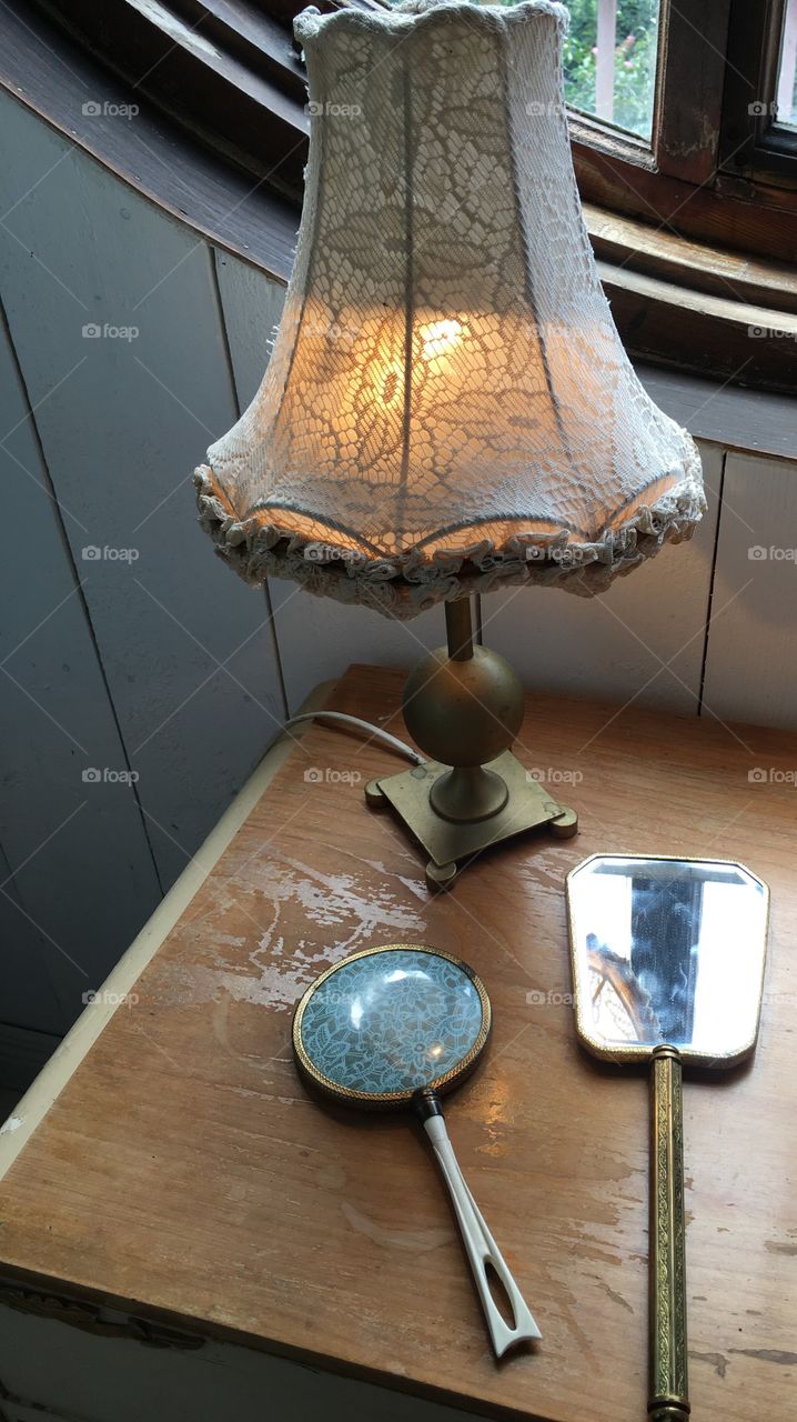 Vintage lamp and hand mirror.