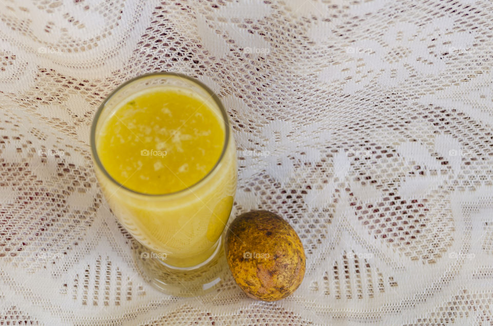 Drinking Glass Of June Plum Juice And Fruit