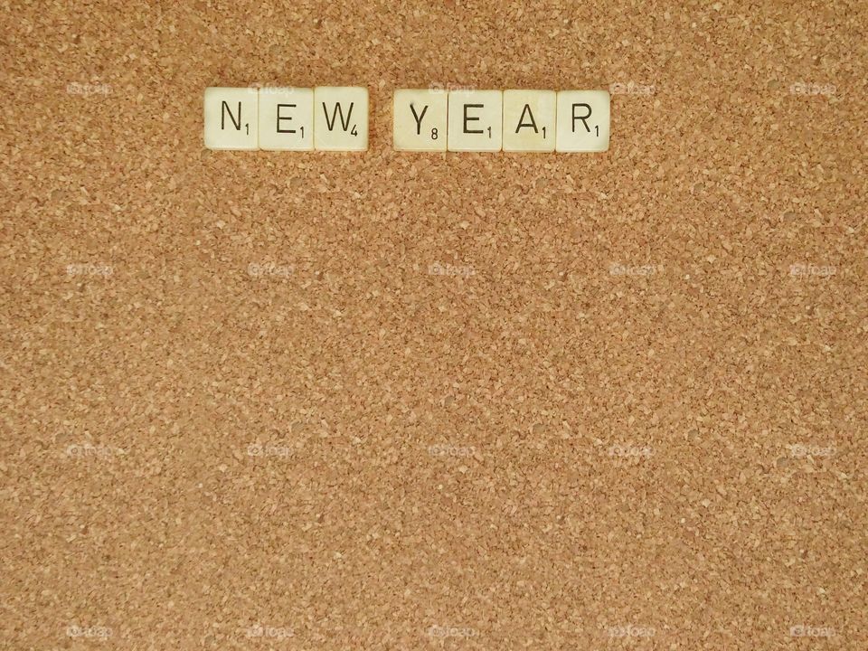 Words on corkboard background