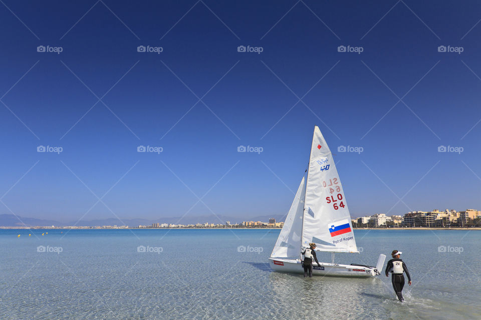 girl sea boat sailing by ideimos