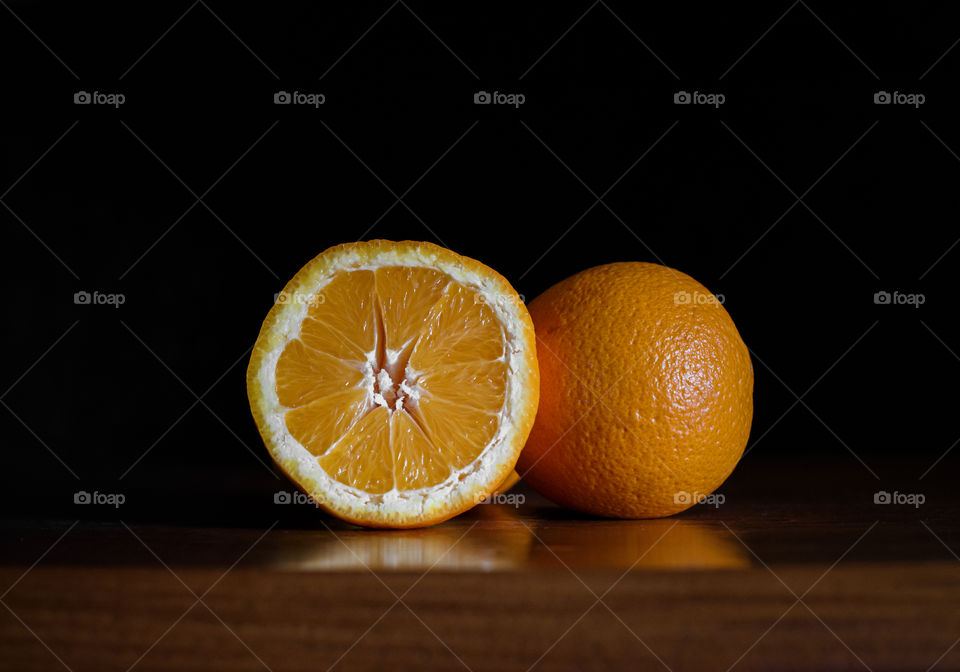 Close-up of orange fruit on table