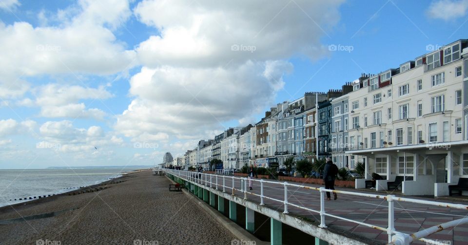 View of the pebble beach and buildings at Hastings