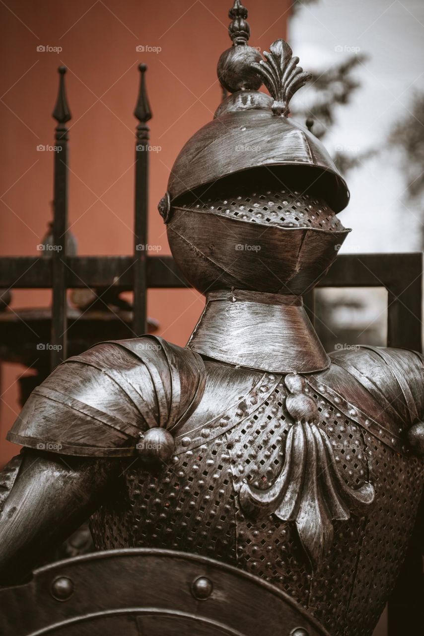 Iron armor of a medieval knight at the city fair.