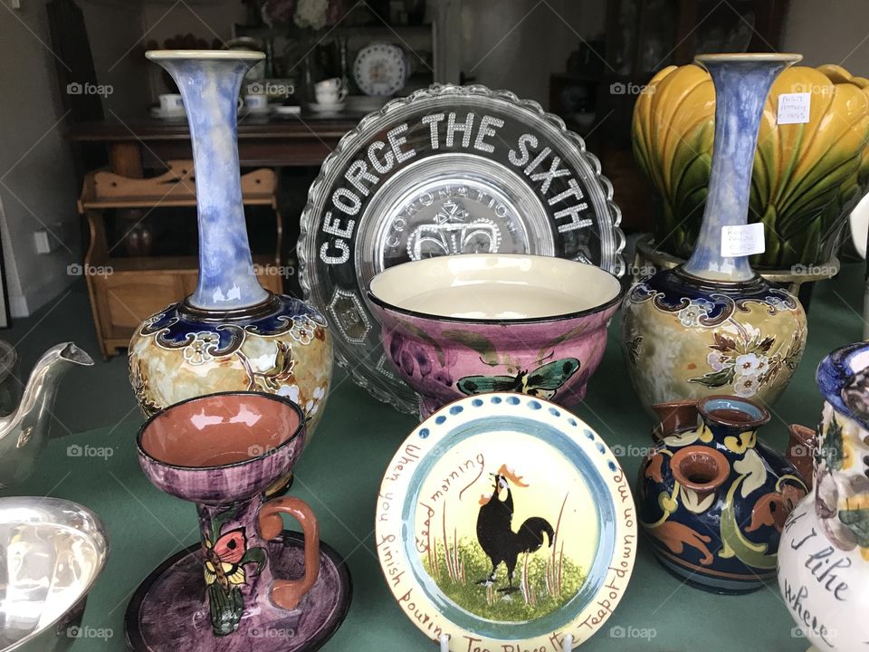 It’s the St George the 5th plate that stands out, from this shop shop window display of antiquities.