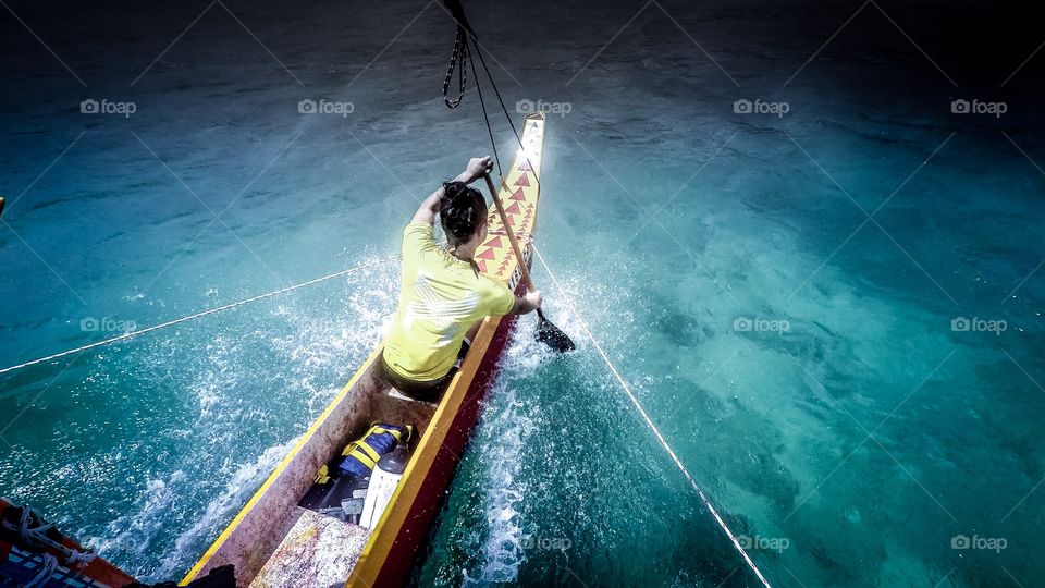Outrigger sailing canoe paddler. Honolulu, Oahu, Hawaii. 