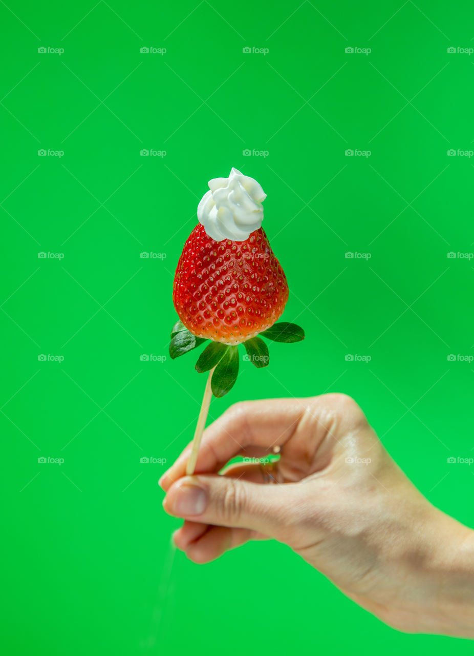 Strawberry in green