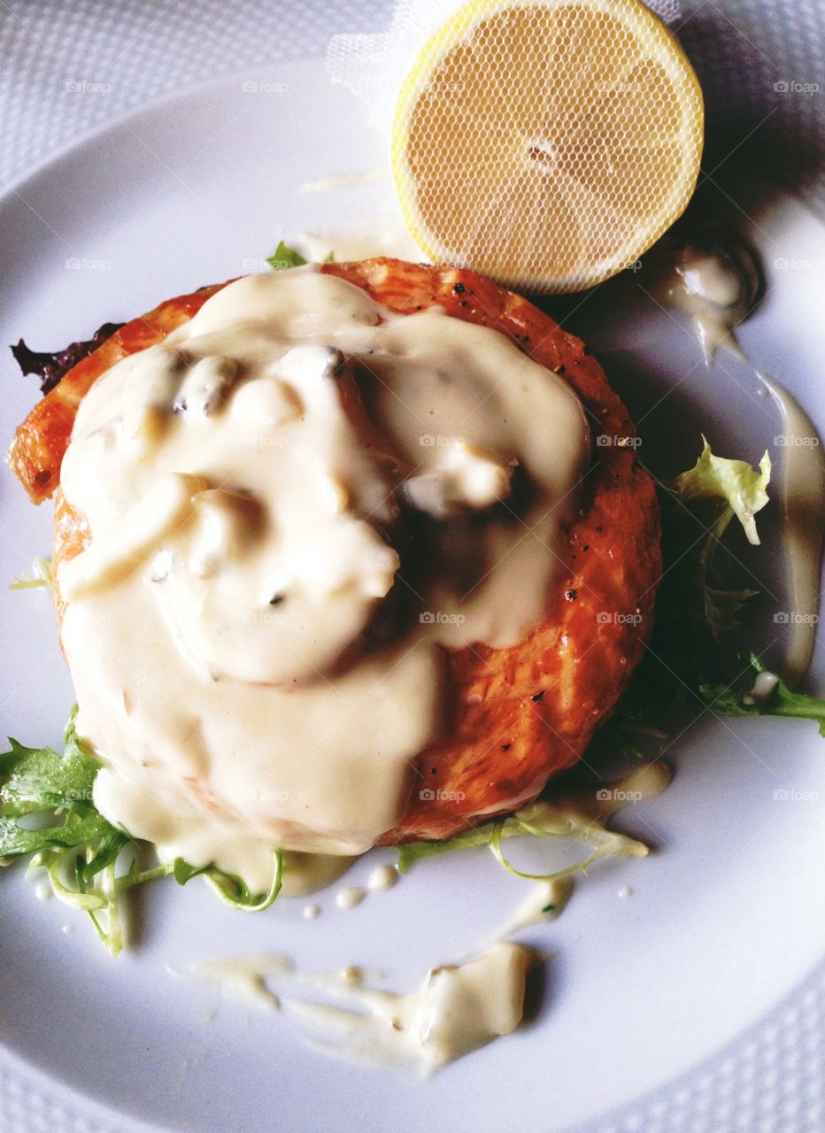 Salmon . Salmon with creamy sous and salad 