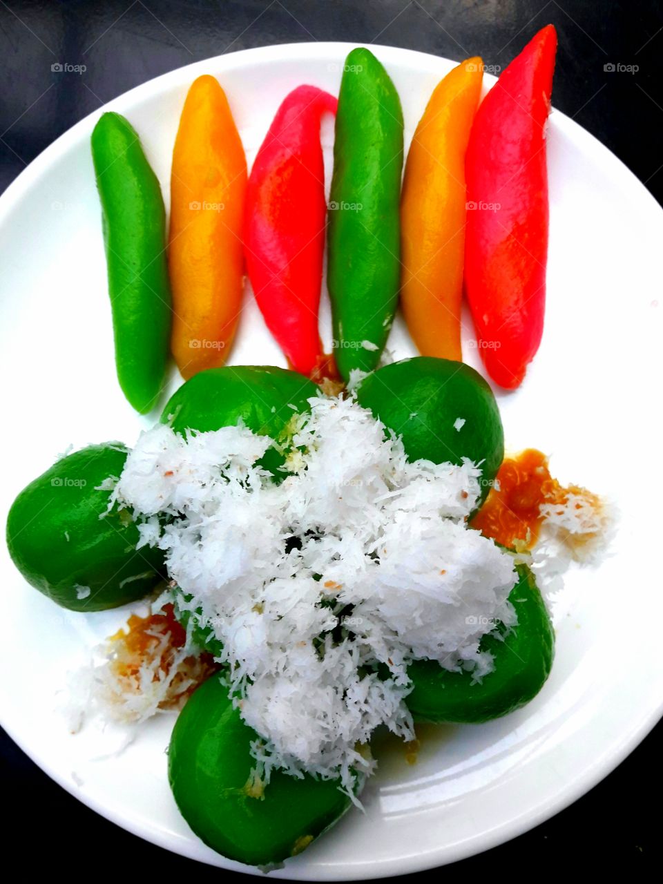 Klanting and Klepon...Klanting and Klepon are Javanese traditional food served with melted brown sugar sauce and shreded coconut