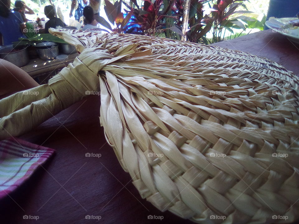 This is a hand woven fan that I received in one of the politicians in the rural place of my Grand mother. I love how I took this picture with this specific angle!