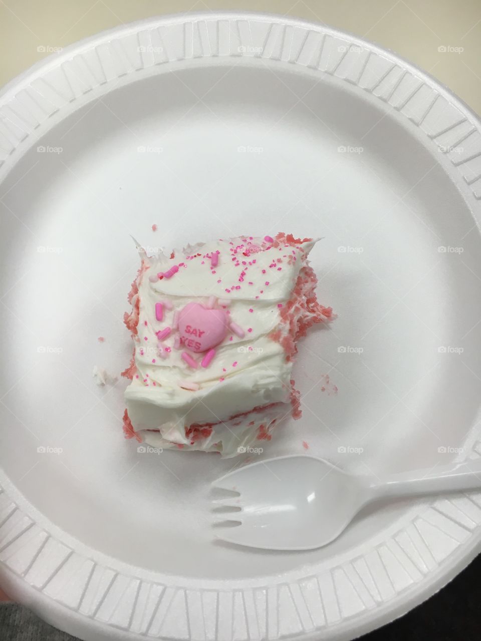 Pink cake white white icing