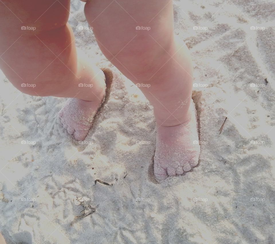 Panama City Beach cute little baby feet in sand at the gulf of mexico