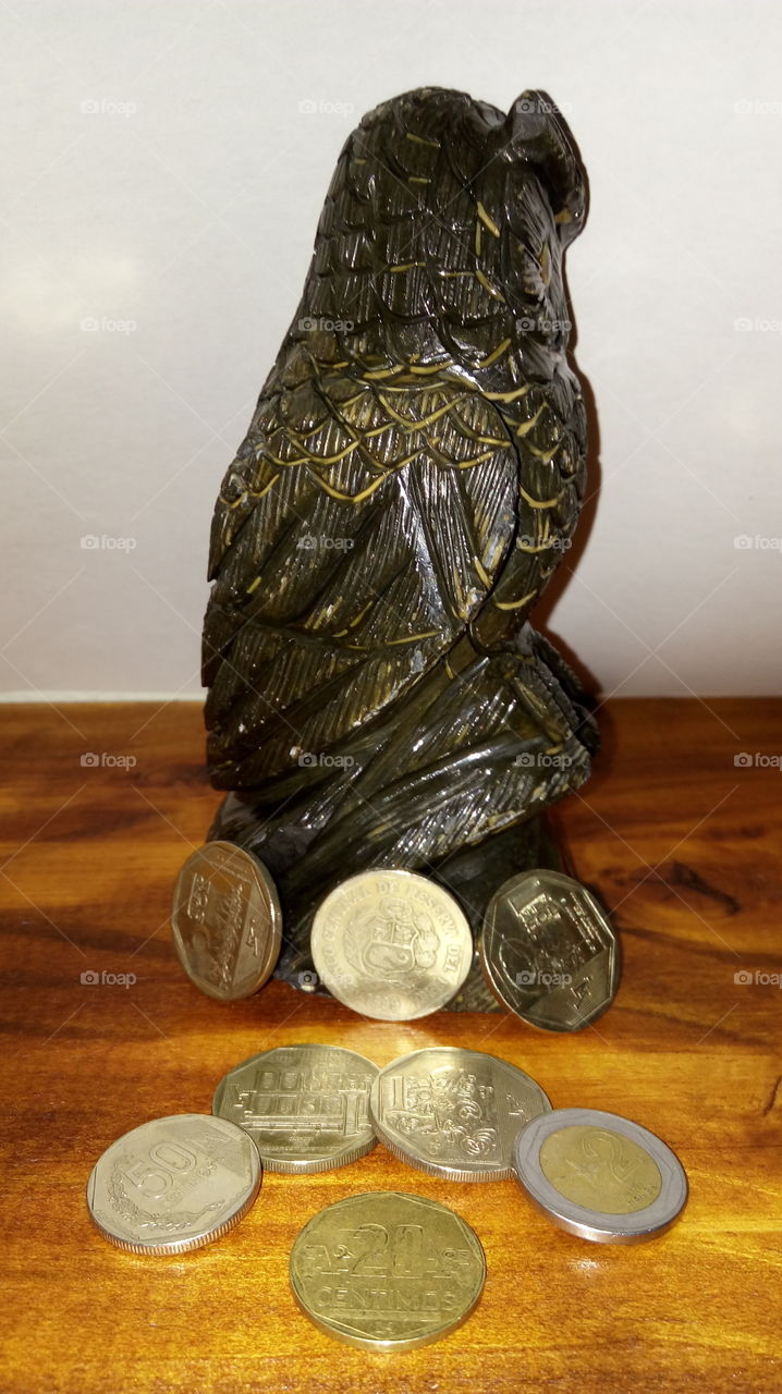 Owl and Peruvian coins