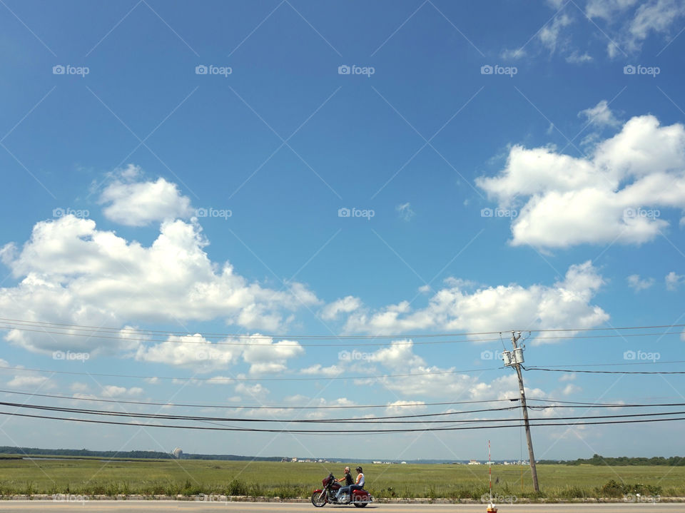 motorcycle ride on blue sky