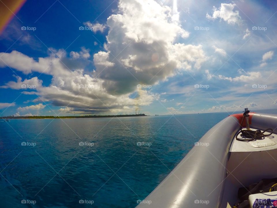 A vacation in the Bahamas. Driving on a speedboat headed to a diving site