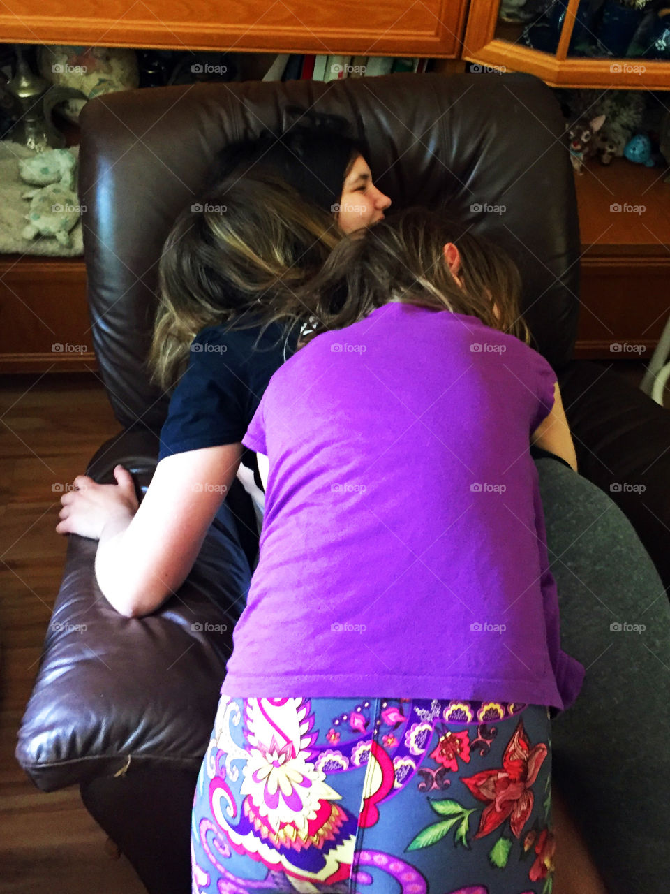 My favourite room in the house is the room where there is the most interaction with my family; my open kitchen -family room. Here my three girls are piling on each other to give big loving bear hugs to each other. Home is where the heart is! ❤️